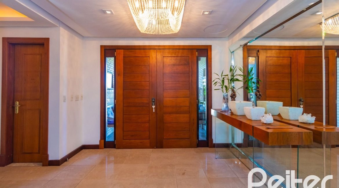 Casa em Condomínio à venda com 600m², 4 dormitórios, 4 suítes, 4 vagas, no bairro Terra Ville em PORTO ALEGRE