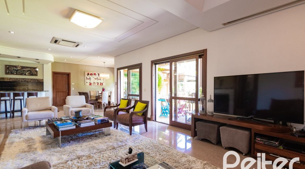 Casa em Condomínio à venda com 600m², 4 dormitórios, 4 suítes, 4 vagas, no bairro Terra Ville em PORTO ALEGRE