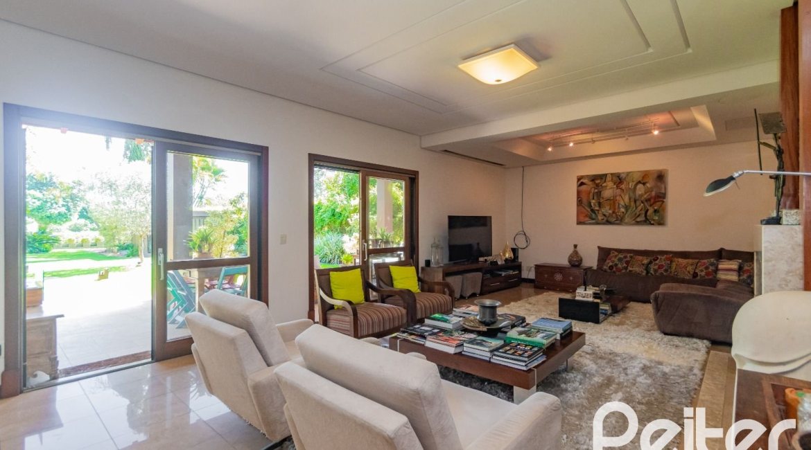 Casa em Condomínio à venda com 600m², 4 dormitórios, 4 suítes, 4 vagas, no bairro Terra Ville em PORTO ALEGRE