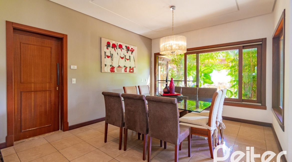 Casa em Condomínio à venda com 600m², 4 dormitórios, 4 suítes, 4 vagas, no bairro Terra Ville em PORTO ALEGRE