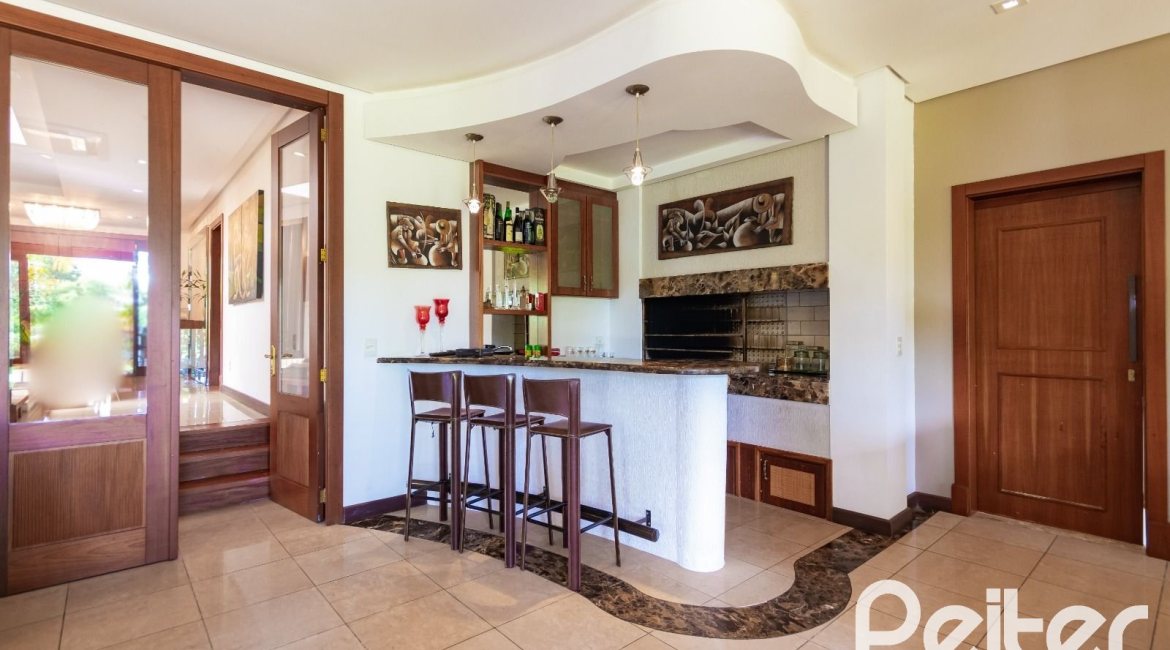 Casa em Condomínio à venda com 600m², 4 dormitórios, 4 suítes, 4 vagas, no bairro Terra Ville em PORTO ALEGRE