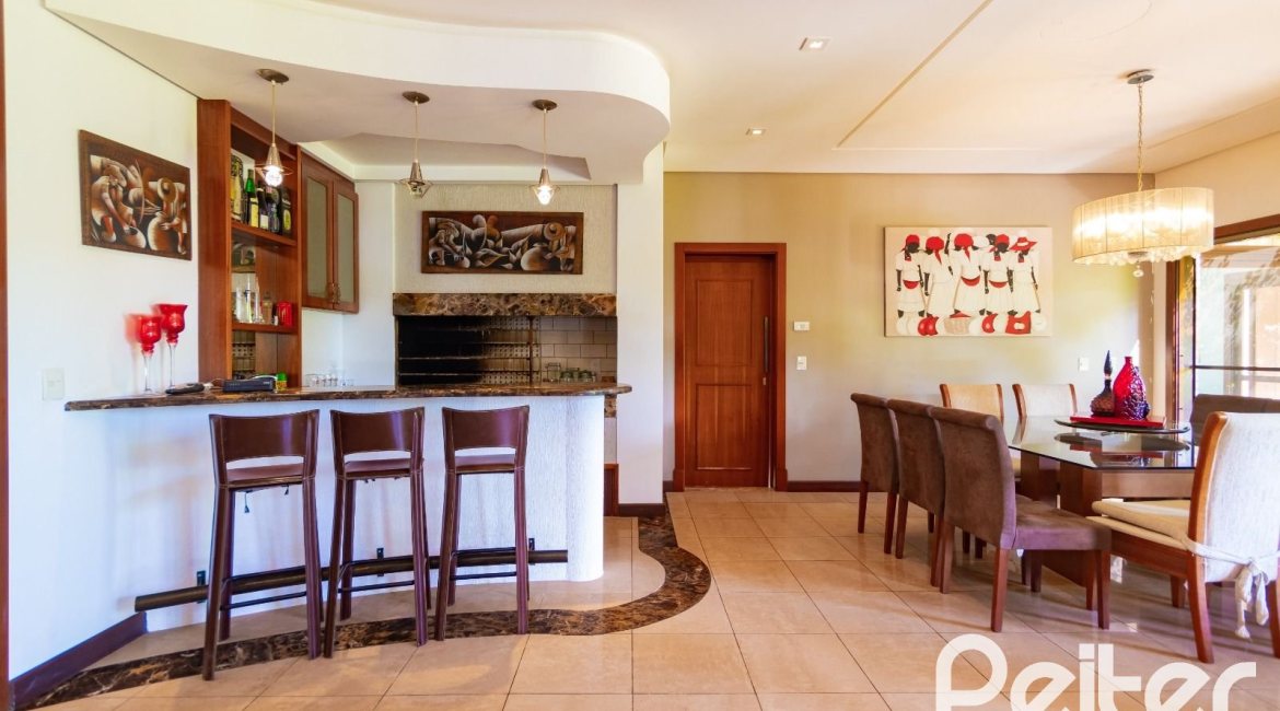 Casa em Condomínio à venda com 600m², 4 dormitórios, 4 suítes, 4 vagas, no bairro Terra Ville em PORTO ALEGRE