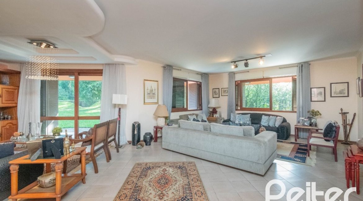 Casa em Condomínio à venda com 486m², 4 dormitórios, 3 suítes, 4 vagas, no bairro Cavalhada em PORTO ALEGRE