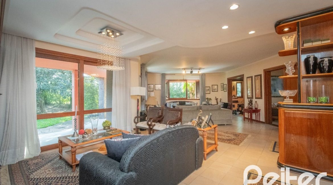 Casa em Condomínio à venda com 486m², 4 dormitórios, 3 suítes, 4 vagas, no bairro Cavalhada em PORTO ALEGRE