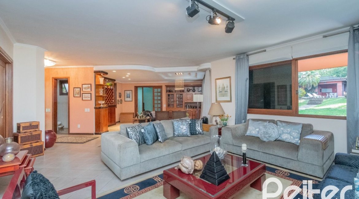 Casa em Condomínio à venda com 486m², 4 dormitórios, 3 suítes, 4 vagas, no bairro Cavalhada em PORTO ALEGRE
