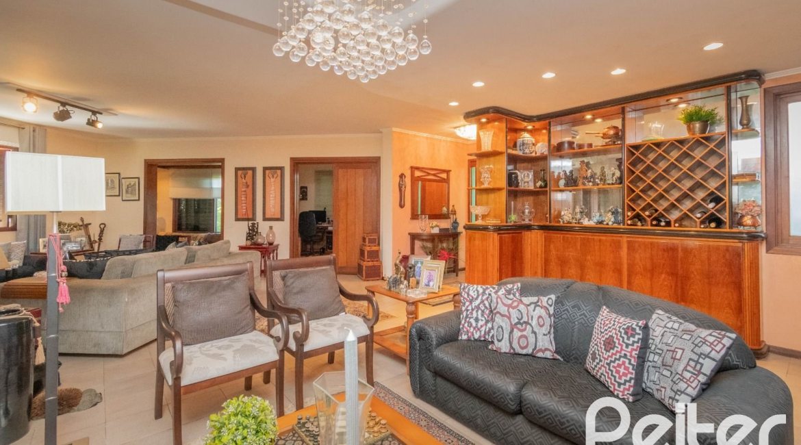 Casa em Condomínio à venda com 486m², 4 dormitórios, 3 suítes, 4 vagas, no bairro Cavalhada em PORTO ALEGRE