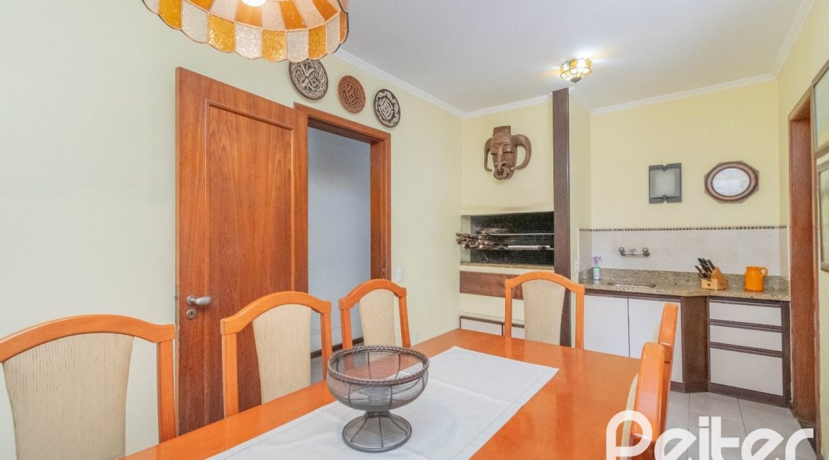 Casa em Condomínio à venda com 486m², 4 dormitórios, 3 suítes, 4 vagas, no bairro Cavalhada em PORTO ALEGRE