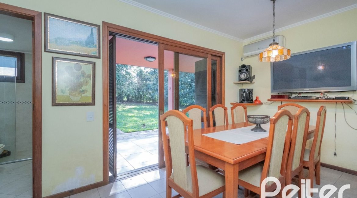 Casa em Condomínio à venda com 486m², 4 dormitórios, 3 suítes, 4 vagas, no bairro Cavalhada em PORTO ALEGRE