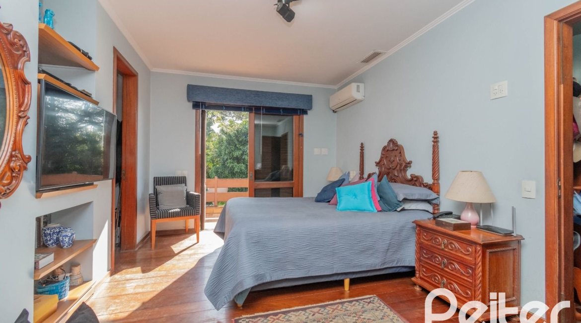 Casa em Condomínio à venda com 486m², 4 dormitórios, 3 suítes, 4 vagas, no bairro Cavalhada em PORTO ALEGRE