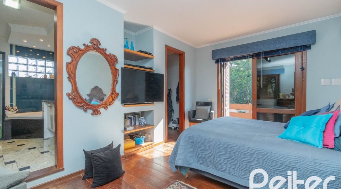 Casa em Condomínio à venda com 486m², 4 dormitórios, 3 suítes, 4 vagas, no bairro Cavalhada em PORTO ALEGRE