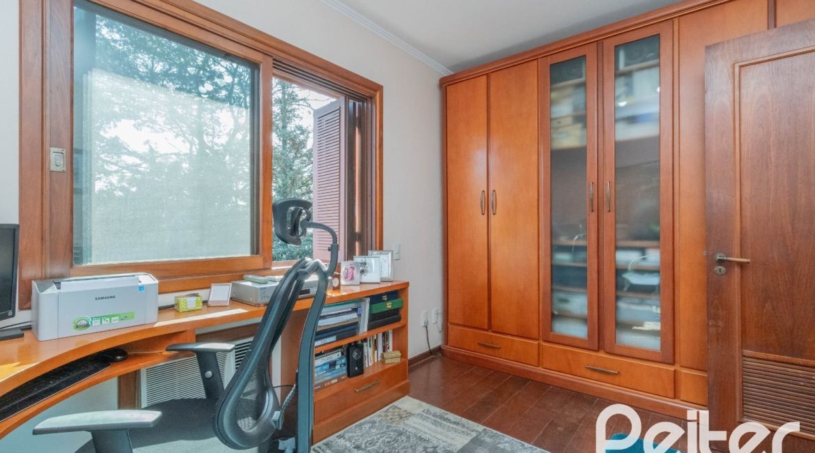 Casa em Condomínio à venda com 486m², 4 dormitórios, 3 suítes, 4 vagas, no bairro Cavalhada em PORTO ALEGRE