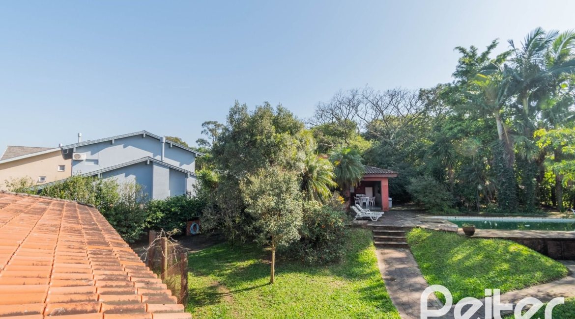 Casa em Condomínio à venda com 486m², 4 dormitórios, 3 suítes, 4 vagas, no bairro Cavalhada em PORTO ALEGRE