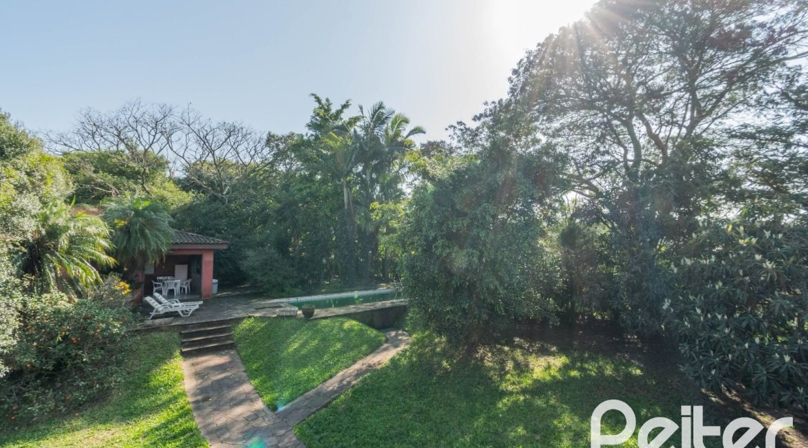 Casa em Condomínio à venda com 486m², 4 dormitórios, 3 suítes, 4 vagas, no bairro Cavalhada em PORTO ALEGRE