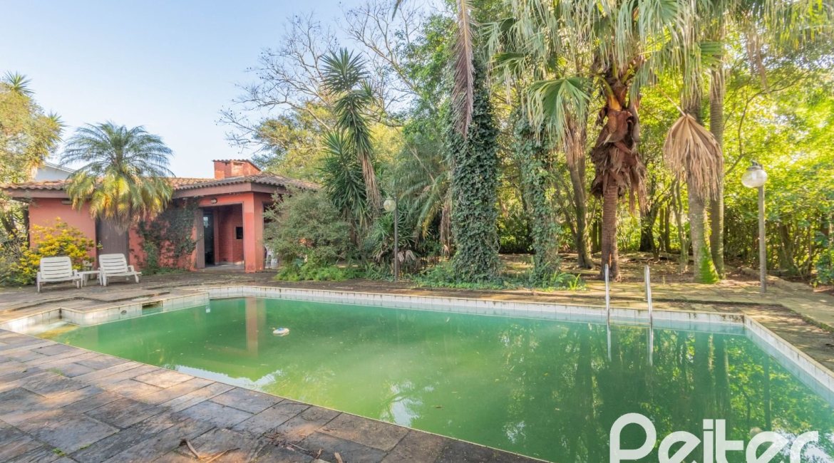 Casa em Condomínio à venda com 486m², 4 dormitórios, 3 suítes, 4 vagas, no bairro Cavalhada em PORTO ALEGRE