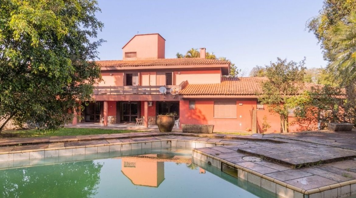 Casa em Condomínio à venda com 486m², 4 dormitórios, 3 suítes, 4 vagas, no bairro Cavalhada em PORTO ALEGRE