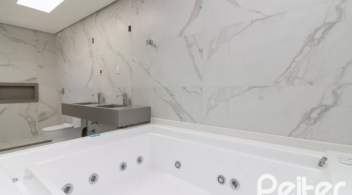 Casa em Condomínio à venda com 209m², 3 dormitórios, 3 suítes, 2 vagas, no bairro Ipanema em Porto Alegre