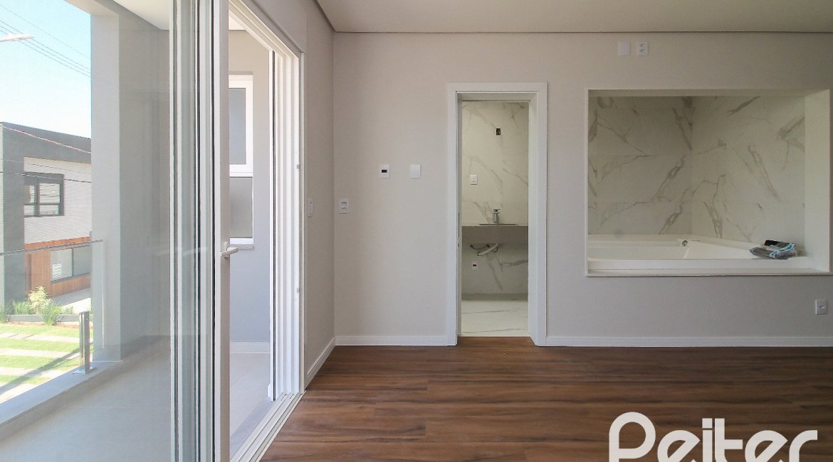 Casa em Condomínio à venda com 209m², 3 dormitórios, 3 suítes, 2 vagas, no bairro Ipanema em Porto Alegre