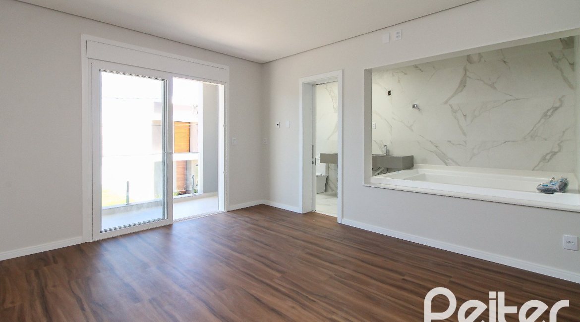 Casa em Condomínio à venda com 209m², 3 dormitórios, 3 suítes, 2 vagas, no bairro Ipanema em Porto Alegre