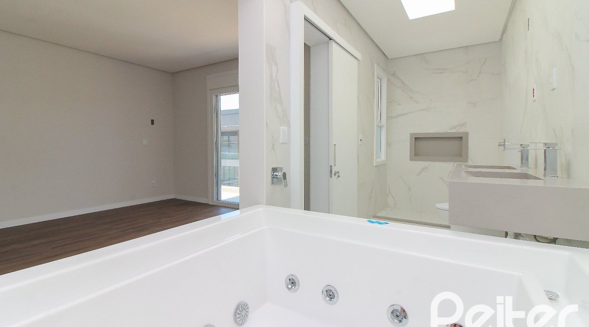 Casa em Condomínio à venda com 209m², 3 dormitórios, 3 suítes, 2 vagas, no bairro Ipanema em Porto Alegre