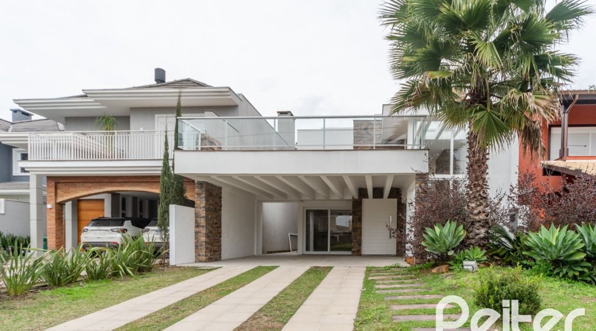 Casa em Condomínio à venda com 294m², 5 dormitórios, 5 suítes, 4 vagas, no bairro Terra Ville em PORTO ALEGRE