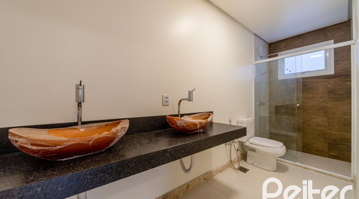 Casa em Condomínio à venda com 294m², 5 dormitórios, 5 suítes, 4 vagas, no bairro Terra Ville em PORTO ALEGRE