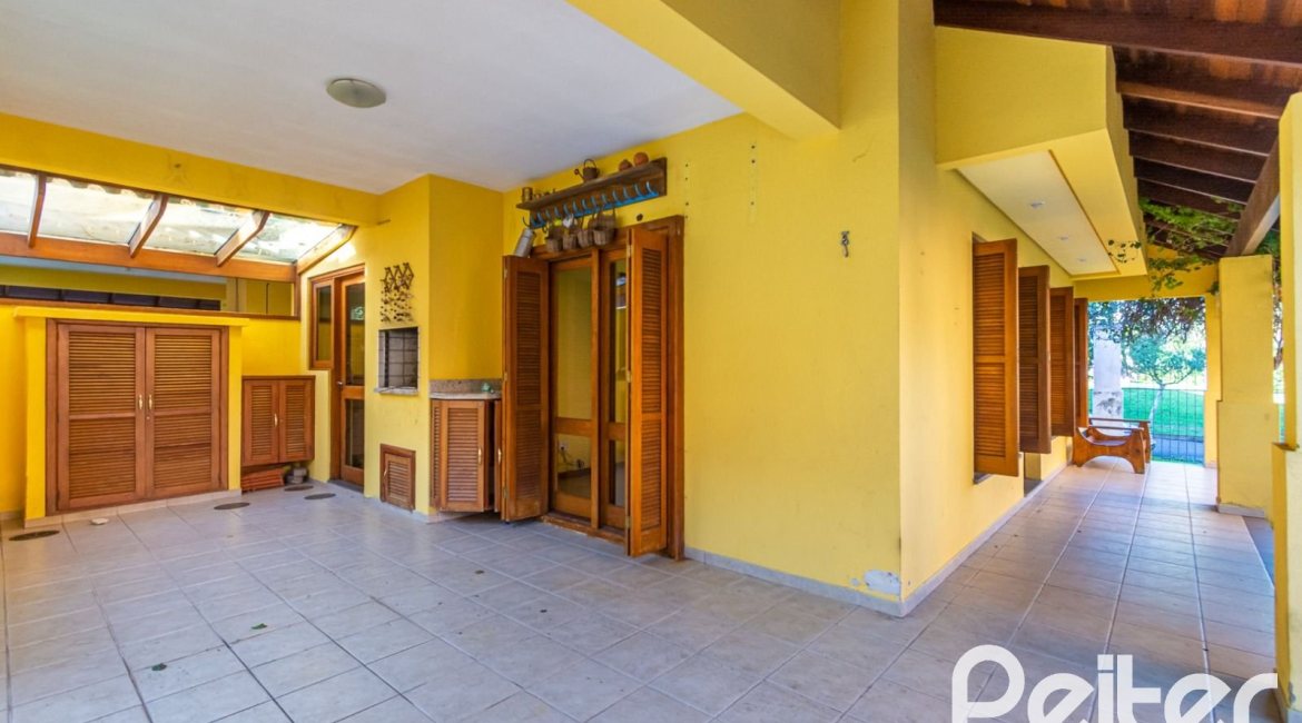 Casa em Condomínio à venda com 174m², 3 dormitórios, 1 suíte, 2 vagas, no bairro Guarujá em Porto Alegre