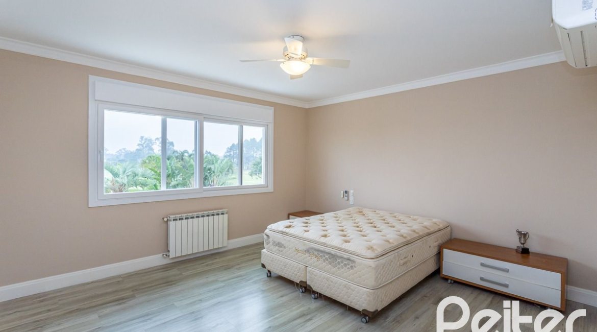 Casa em Condomínio à venda com 615m², 4 dormitórios, 4 suítes, 6 vagas, no bairro Terra Ville em PORTO ALEGRE