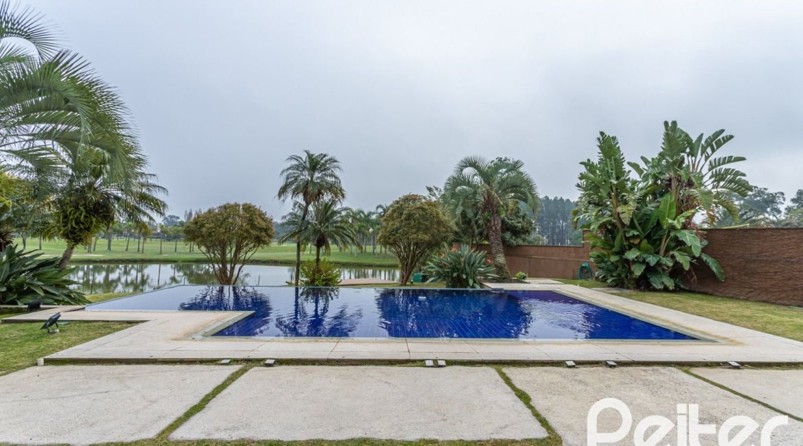 Casa em Condomínio à venda com 615m², 4 dormitórios, 4 suítes, 6 vagas, no bairro Terra Ville em PORTO ALEGRE