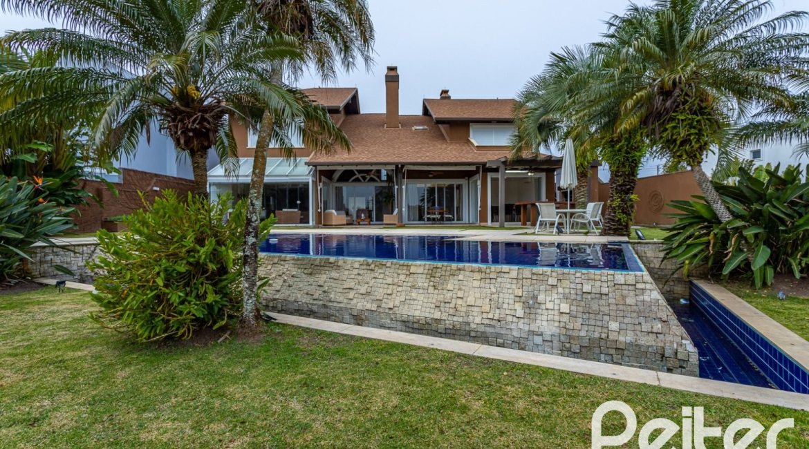 Casa em Condomínio à venda com 615m², 4 dormitórios, 4 suítes, 6 vagas, no bairro Terra Ville em PORTO ALEGRE