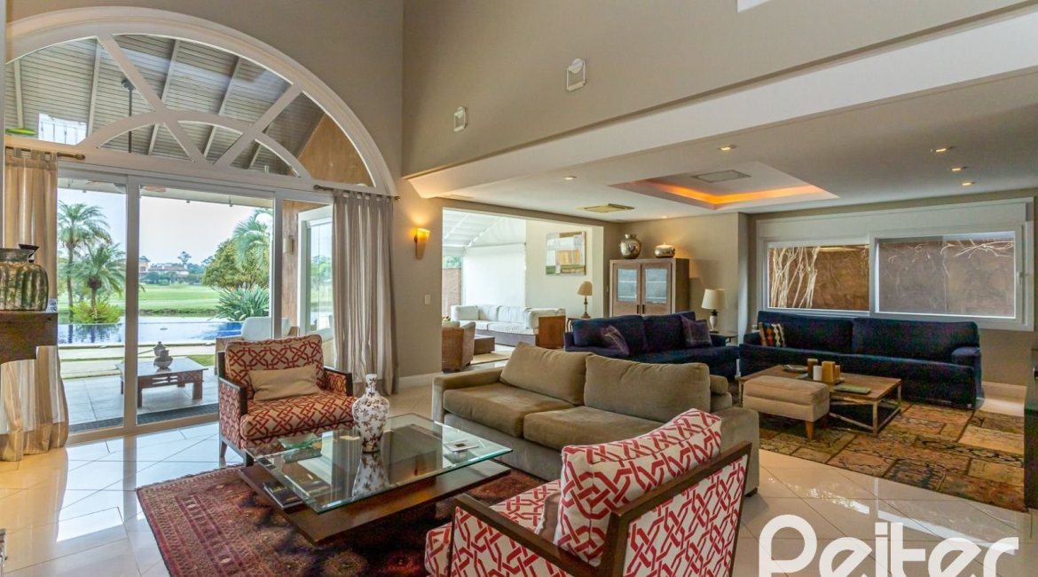 Casa em Condomínio à venda com 615m², 4 dormitórios, 4 suítes, 6 vagas, no bairro Terra Ville em PORTO ALEGRE