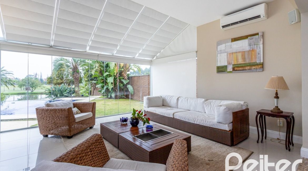 Casa em Condomínio à venda com 615m², 4 dormitórios, 4 suítes, 6 vagas, no bairro Terra Ville em PORTO ALEGRE