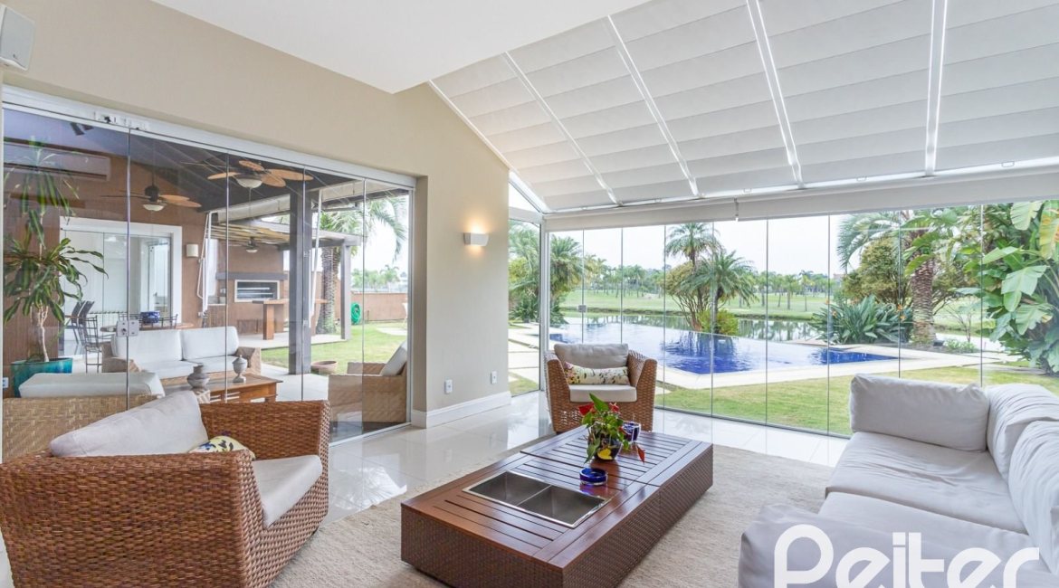 Casa em Condomínio à venda com 615m², 4 dormitórios, 4 suítes, 6 vagas, no bairro Terra Ville em PORTO ALEGRE