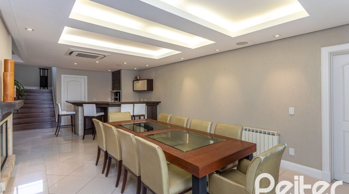 Casa em Condomínio à venda com 615m², 4 dormitórios, 4 suítes, 6 vagas, no bairro Terra Ville em PORTO ALEGRE