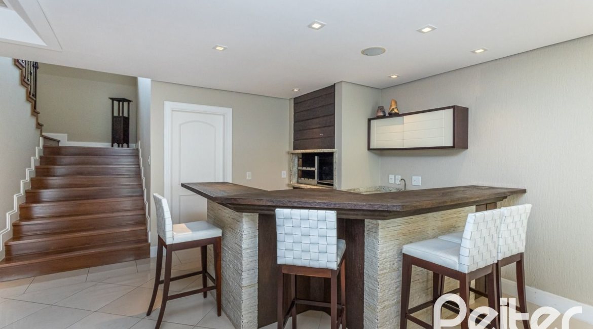 Casa em Condomínio à venda com 615m², 4 dormitórios, 4 suítes, 6 vagas, no bairro Terra Ville em PORTO ALEGRE