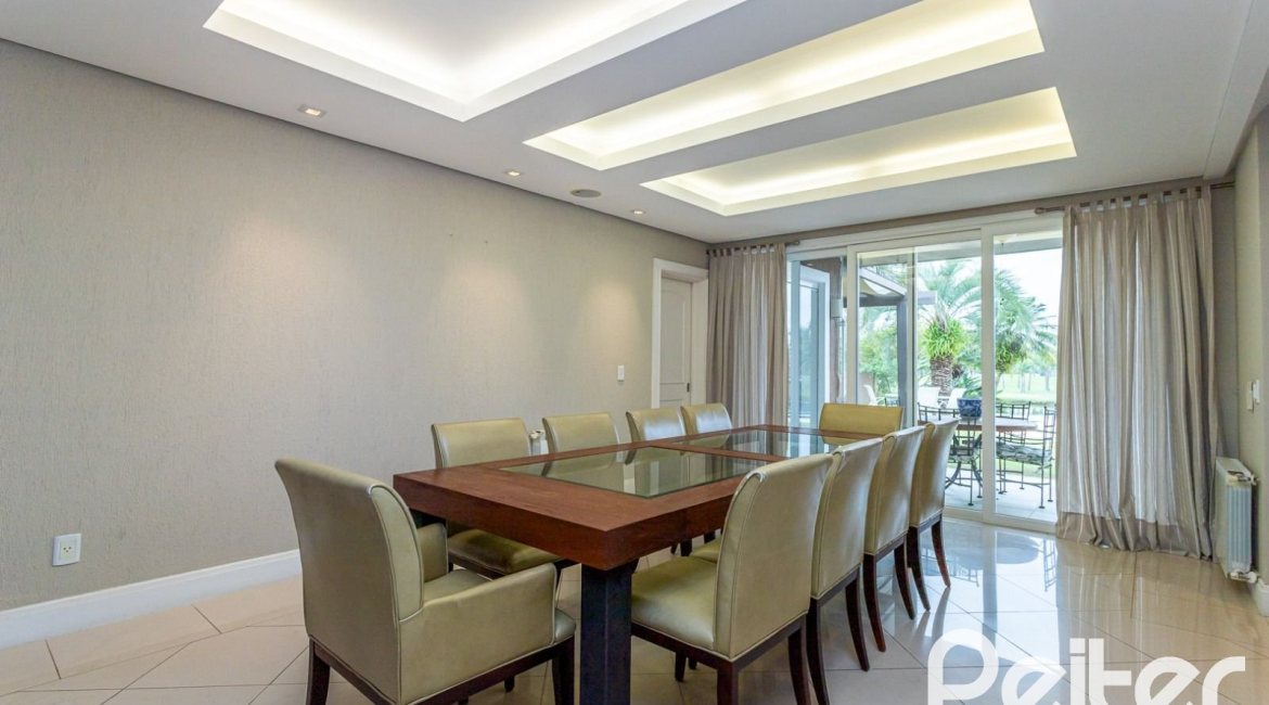Casa em Condomínio à venda com 615m², 4 dormitórios, 4 suítes, 6 vagas, no bairro Terra Ville em PORTO ALEGRE