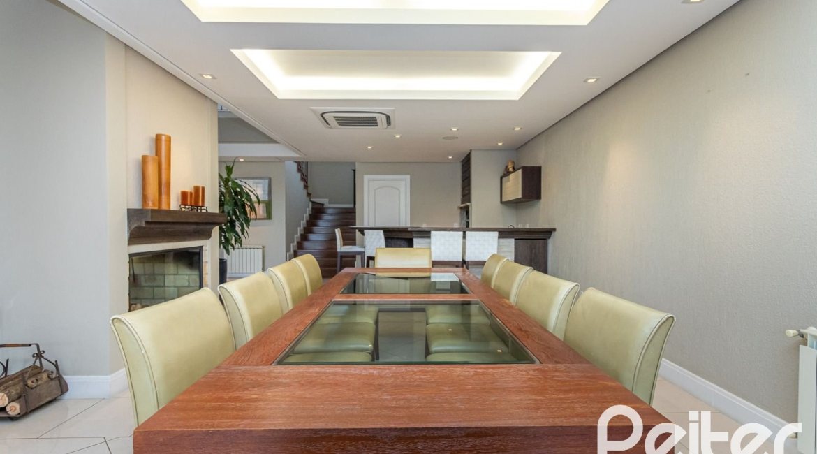 Casa em Condomínio à venda com 615m², 4 dormitórios, 4 suítes, 6 vagas, no bairro Terra Ville em PORTO ALEGRE