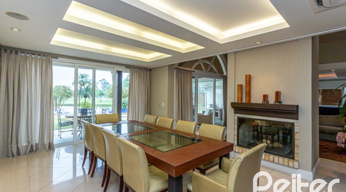 Casa em Condomínio à venda com 615m², 4 dormitórios, 4 suítes, 6 vagas, no bairro Terra Ville em PORTO ALEGRE