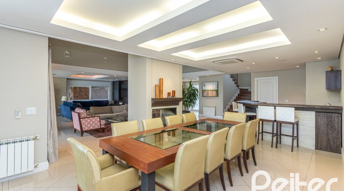 Casa em Condomínio à venda com 615m², 4 dormitórios, 4 suítes, 6 vagas, no bairro Terra Ville em PORTO ALEGRE