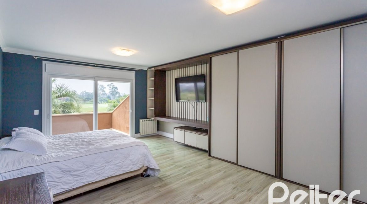 Casa em Condomínio à venda com 615m², 4 dormitórios, 4 suítes, 6 vagas, no bairro Terra Ville em PORTO ALEGRE