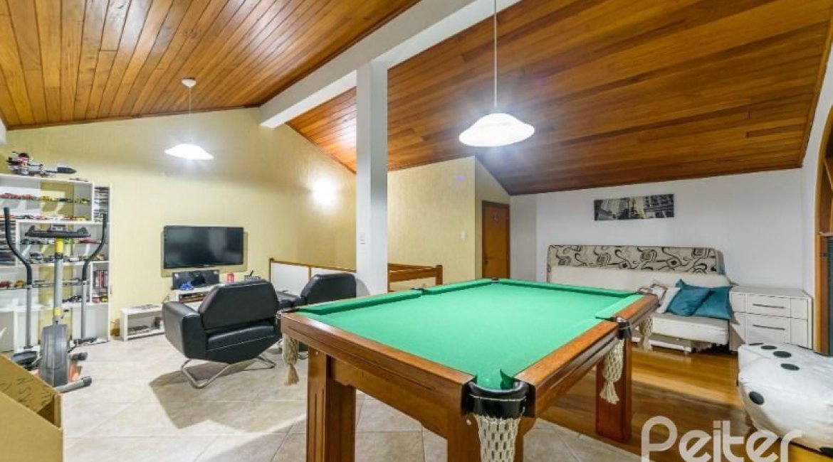 Casa em Condomínio à venda com 170m², 3 dormitórios, 1 suíte, 2 vagas, no bairro Jardim Isabel em Porto Alegre