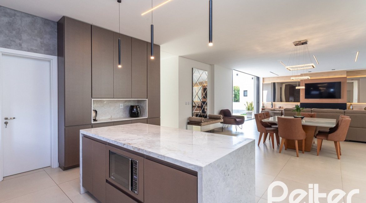 Casa em Condomínio à venda com 344m², 4 dormitórios, 4 suítes, 4 vagas, no bairro Alphaville em PORTO ALEGRE