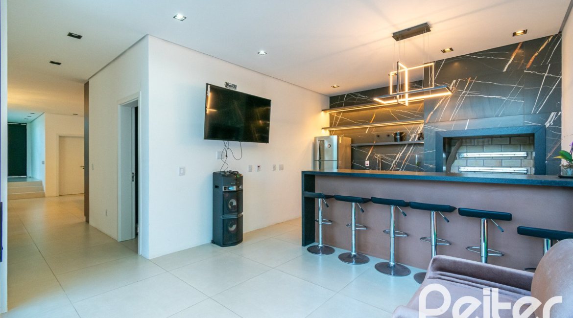 Casa em Condomínio à venda com 344m², 4 dormitórios, 4 suítes, 4 vagas, no bairro Alphaville em PORTO ALEGRE