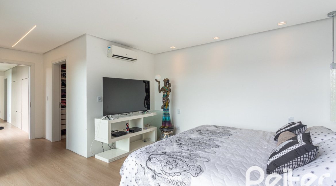 Casa em Condomínio à venda com 344m², 4 dormitórios, 4 suítes, 4 vagas, no bairro Alphaville em PORTO ALEGRE