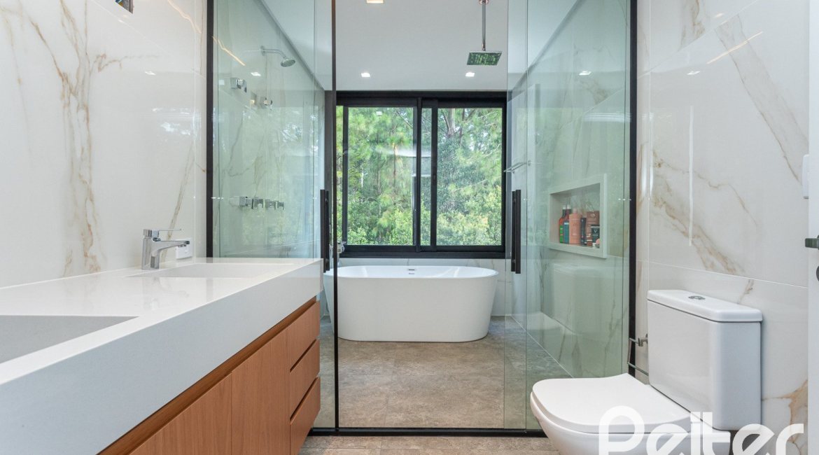 Casa em Condomínio à venda com 344m², 4 dormitórios, 4 suítes, 4 vagas, no bairro Alphaville em PORTO ALEGRE