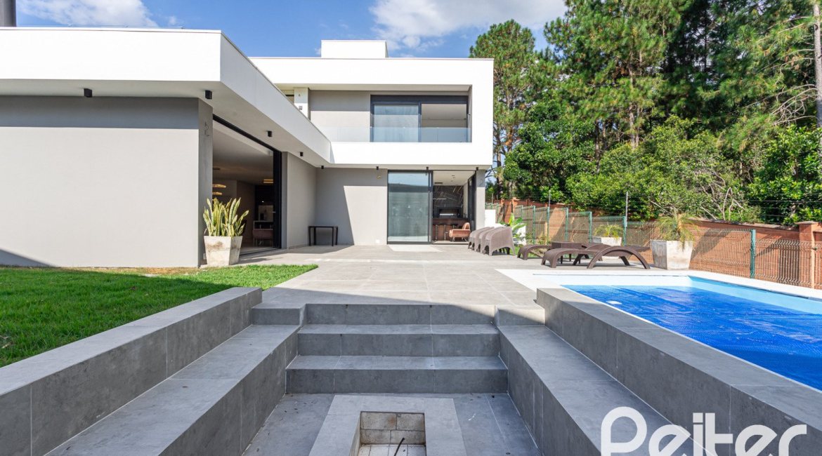 Casa em Condomínio à venda com 344m², 4 dormitórios, 4 suítes, 4 vagas, no bairro Alphaville em PORTO ALEGRE