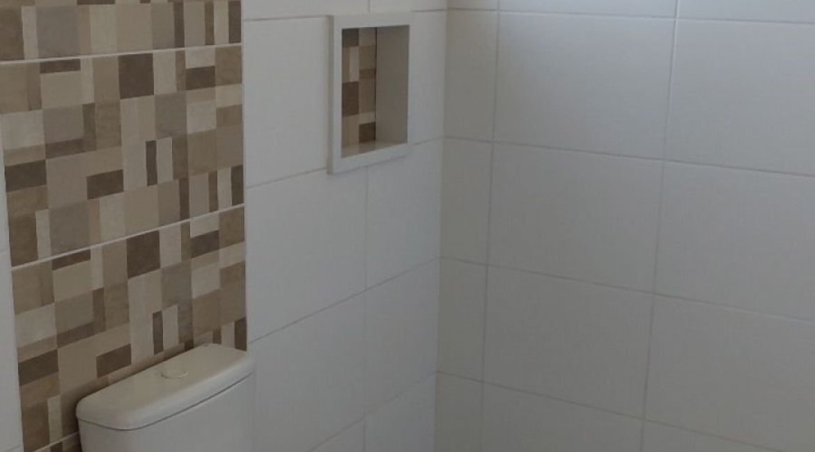 Casa à venda com 88m², 3 dormitórios, 2 suítes, 1 vaga, no bairro Guarujá em Porto Alegre