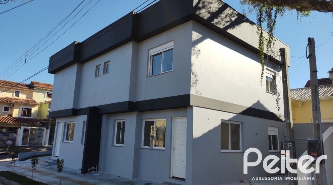 Casa à venda com 88m², 3 dormitórios, 2 suítes, 1 vaga, no bairro Guarujá em Porto Alegre