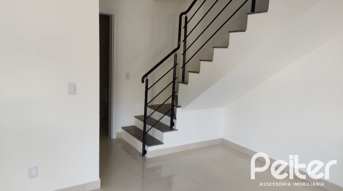 Casa à venda com 88m², 3 dormitórios, 2 suítes, 1 vaga, no bairro Guarujá em Porto Alegre