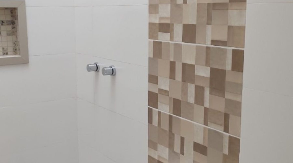 Casa à venda com 88m², 3 dormitórios, 2 suítes, 1 vaga, no bairro Guarujá em Porto Alegre