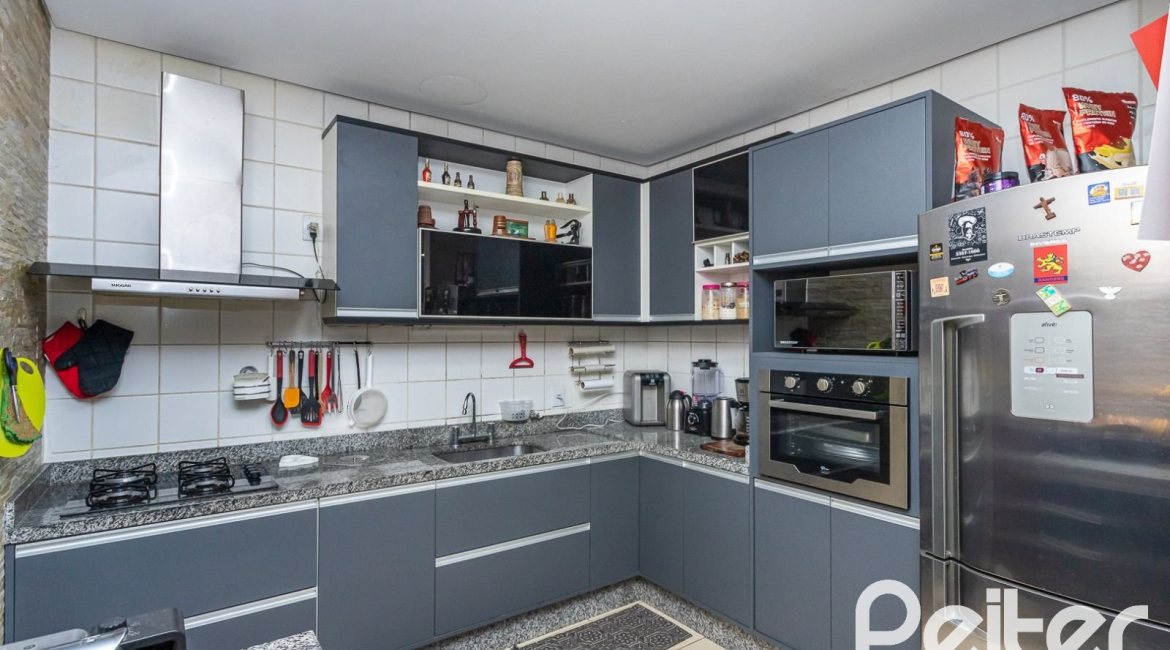 Casa em Condomínio à venda com 239m², 3 dormitórios, 3 suítes, 3 vagas, no bairro Santa Tereza em Porto Alegre